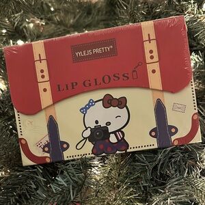 New in box sealed 24 Lip Gloss Set with attachable pearl handle